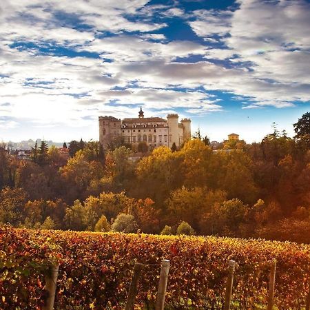 コスティリオーレ・ダスティ La Rocca Di Efisioアパートホテル エクステリア 写真